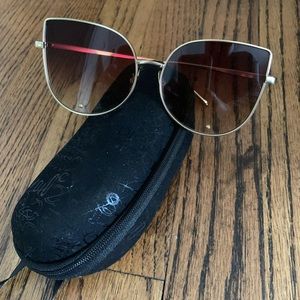 Gold framed sunglasses